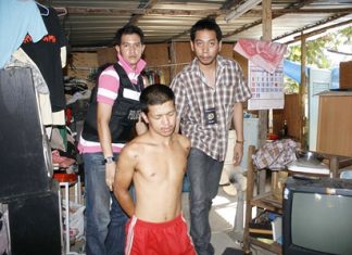 Police arrest Chonathee Jaiprayong at his Nong Prue home.